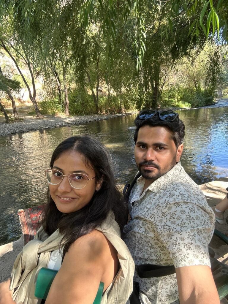 Tushar and Sanju by the river on the Green Tour