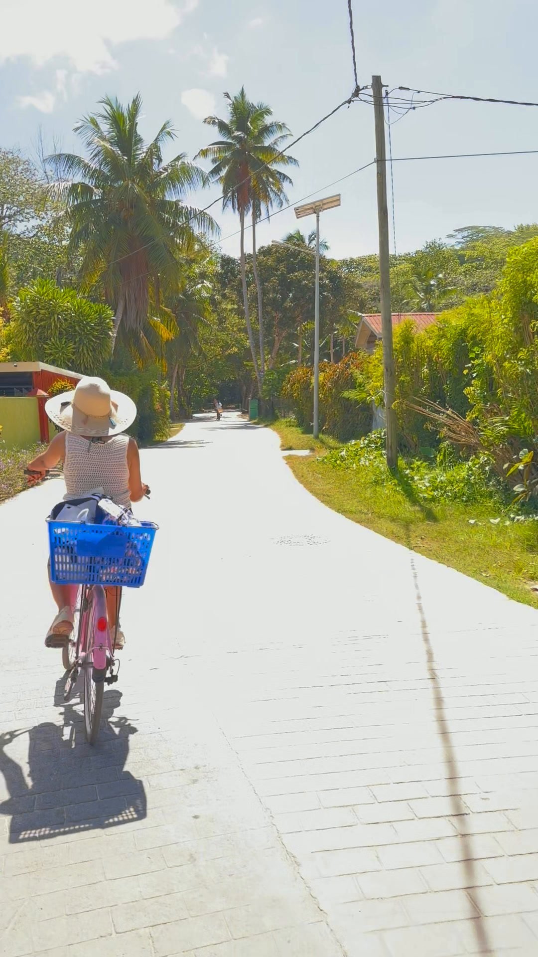 Sanju cycling on La Digue, Seychelles