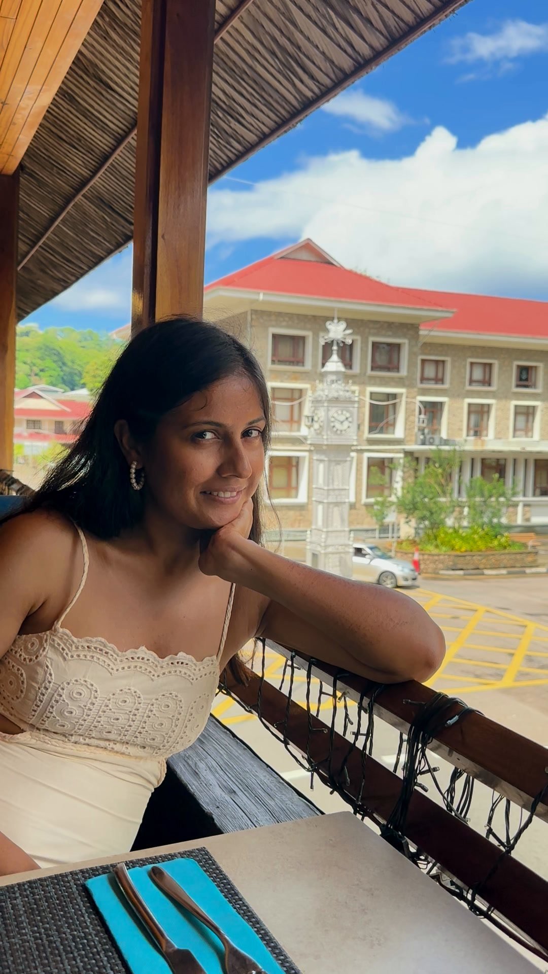 Sanju at a balcony restaurant in Victoria, Seychelles