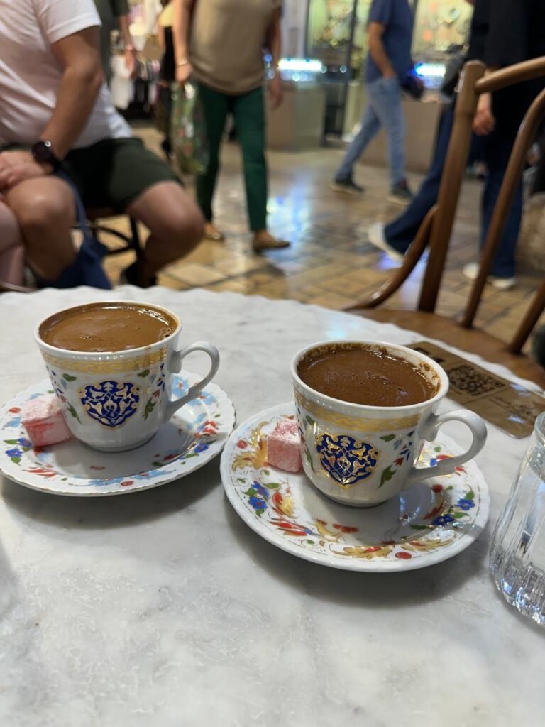 Two cups of Turkish coffee with Turkish delight